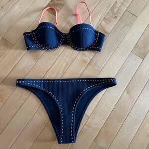 Triangl top and bottom bikini. Top is XS. Bottom is S.